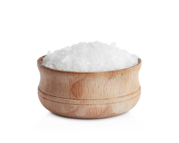 istock Natural salt in bowl isolated on white 1314937682