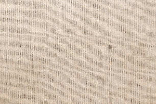 istock Brown cotton fabric texture background, seamless pattern of natural textile. 1314937859