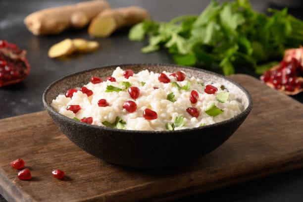 istock Curd Rice with pomegranate, cilantro, mustard seeds, ginger. Indian cuisine 1314941180