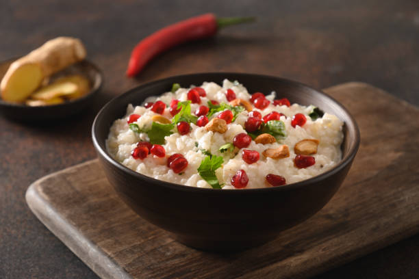istock Curd Rice with pomegranate, cilantro, mustard seeds, ginger. Indian cuisine 1314941595