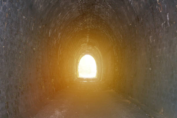 istock Exit from the tunnel to the flare of the sun. 1314945590