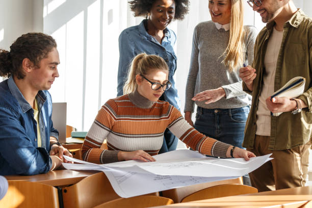 istock Group of design students in the classroom. 1314946588