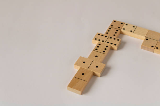 istock A game of dominoes on a light background. Close-up. Selective focus. 1314949345