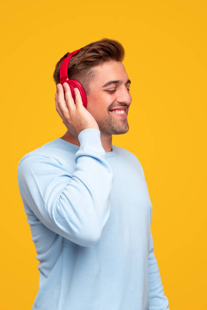 istock Young man listening to good music 1314949389