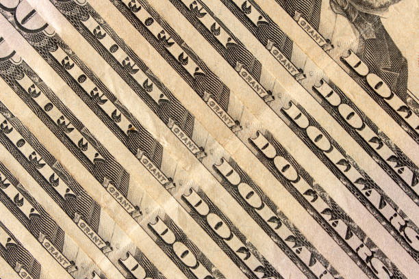 istock Abstract background of 50 dollar bills. Selective focus. 1314949401