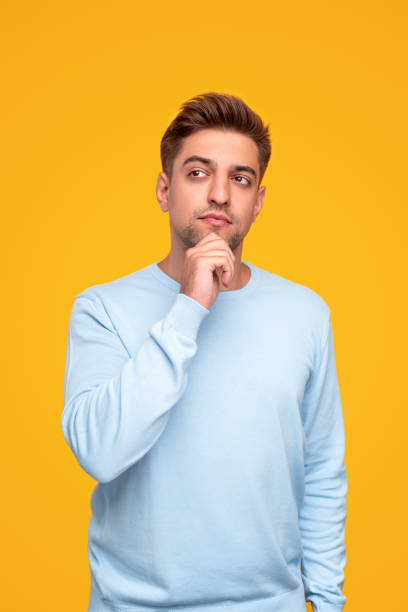 istock Thoughtful young man in casual outfit 1314949437