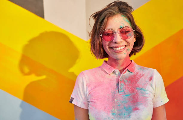 istock Optimistic lady during paint festival 1314949461