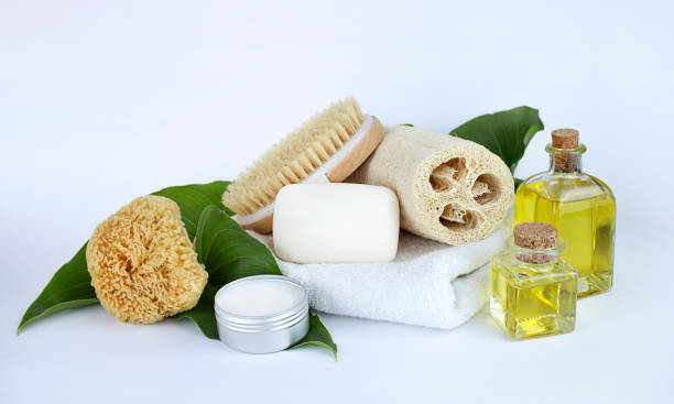 istock Soap bars, white towel, natural brush and sponges. 1314949913