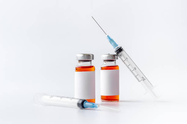 istock Vaccine vial dose with with syringe. Vaccination concept 1314950964