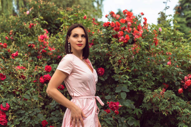 istock Young woman in spring park 1314952267