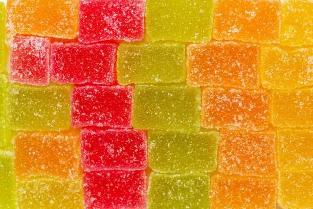 Slab Jelly Gummy Square Candy Colorful Desserts with Crystallized Sugar making a Background Pattern