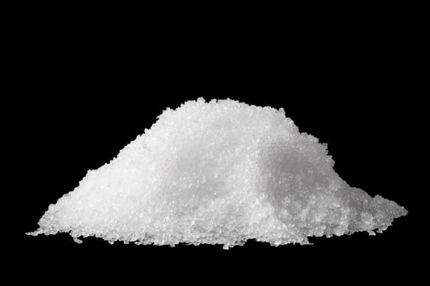 istock Heap of white snow isolated on black background 1314953289