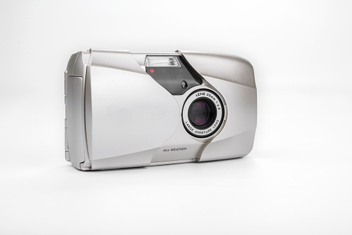 Analog compact camera on a white background