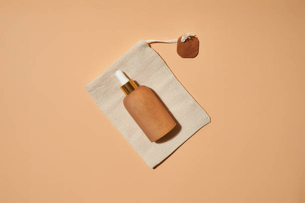 istock Cosmetological bottle lying on cotton bag 1314956210