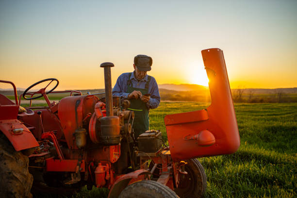 istock Farmer is talking on the phone 1314957210