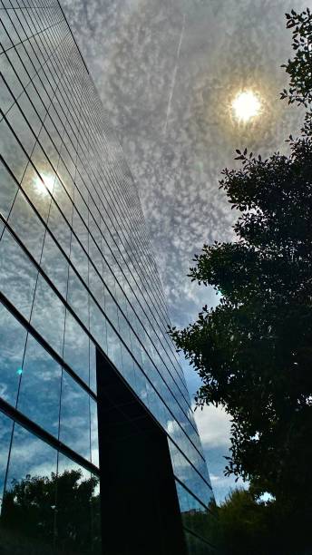 istock clouds and glass - a story of reflection 1314957306