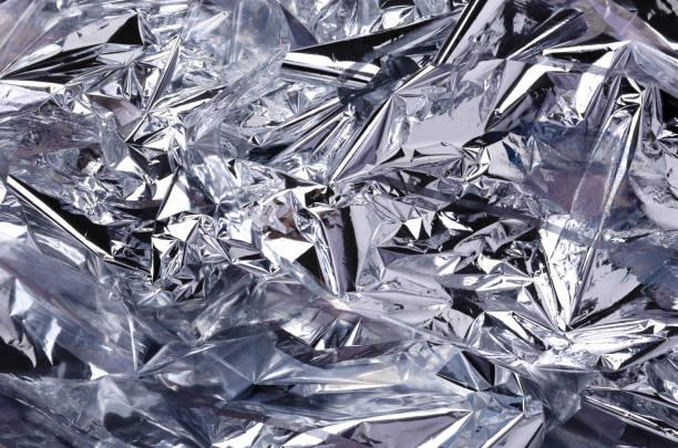 istock Cumpled shiny foil background.Empy space.Wrinkled background 1314960743