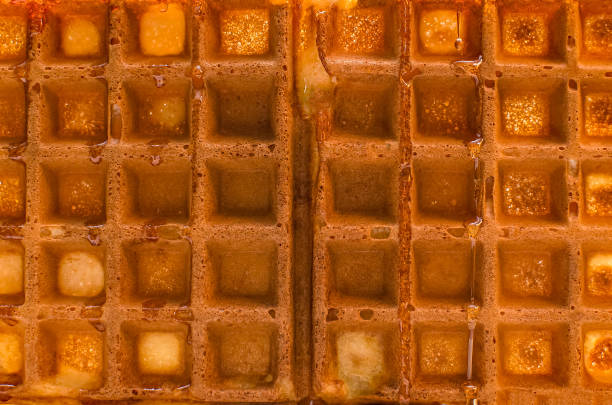 homemade Belgian waffles, crispy waffles close-up on the table