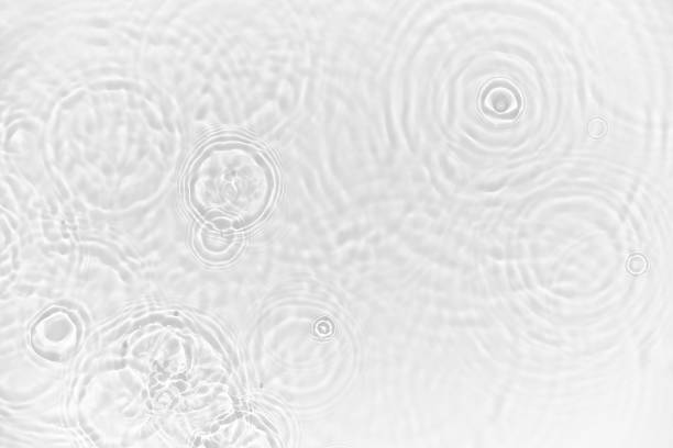 Water background. White water texture, blue mint water surface with rings and ripple. Spa concept background. Flat lay, top view, copy space, copy-space
