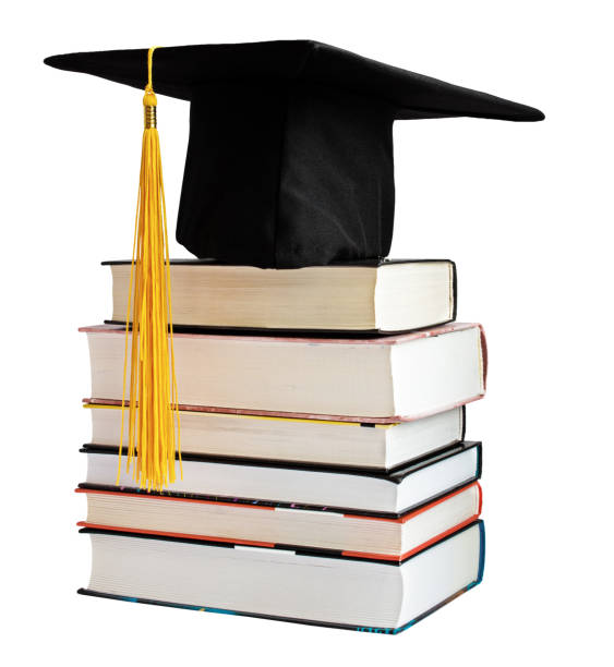 istock Graduate cap on stack of books isolated 1314971429