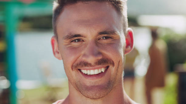 istock Shot of a young man smiling while outside 1314971658