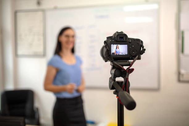 istock Cheerful woman tutor working online. 1314972446