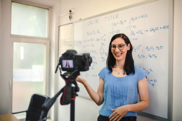 istock Cheerful woman tutor working online. 1314972562