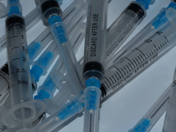 istock Several syringe on white table prepared for injection in hospital 1314973480