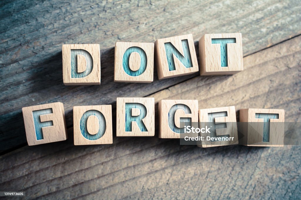 Don't Forget Written On Wooden Blocks On A Board - Reminder Concept Don't Forget Written On Blocks On A Wooden Board - Reminder Concept Reminder Stock Photo