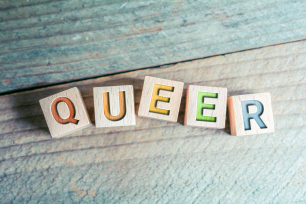 istock Queer In Colored Letters Written On Wooden Blocks On A Board 1314973635