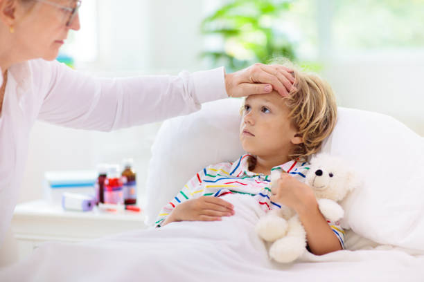 istock Sick little boy with asthma medicine. Ill child. 1314973783