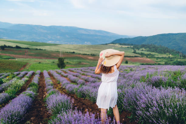 istock Beautiful woman in lavender field 1314976543