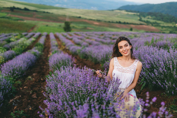 istock Young joyful woman in lavender field 1314978316