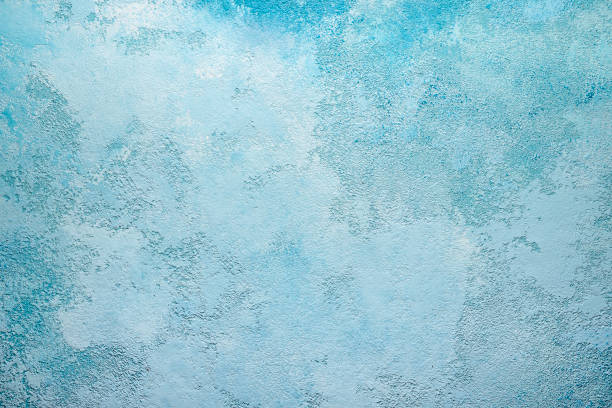 istock Beautiful abstract grunge decorative light blue cyan painted stucco wall texture. Handmade rough paper white background with copy space, sky texture 1314978382