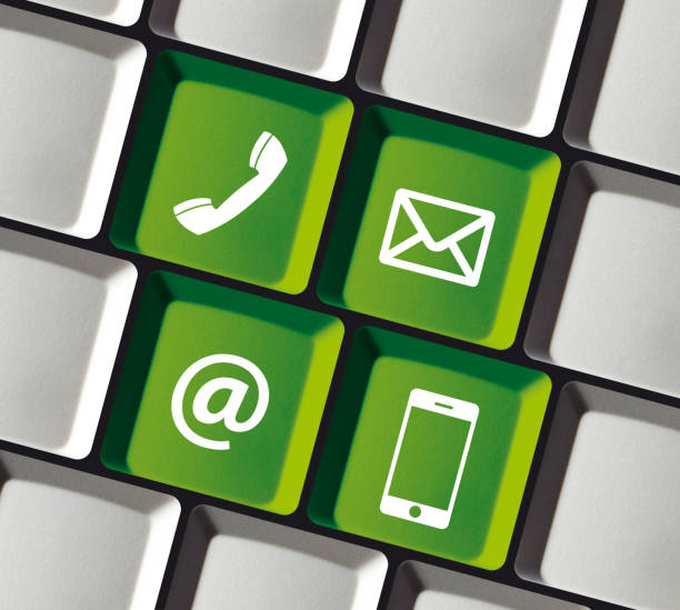istock Contact Icons on Computer Keyboard Phone Email Mobile 1314980078