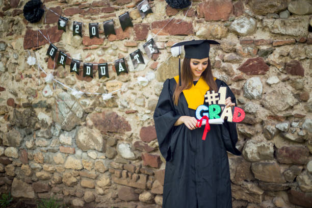 istock Excited young woman on graduation day 1314981311