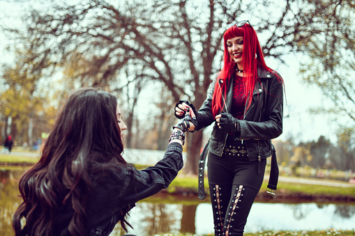 Lesbian Proposal By Gothic Females In Park