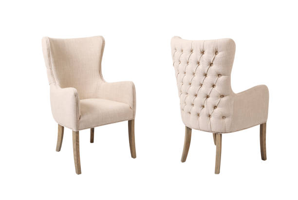 istock Back and front view of beige wingback tufted armchair on white background 1314987064