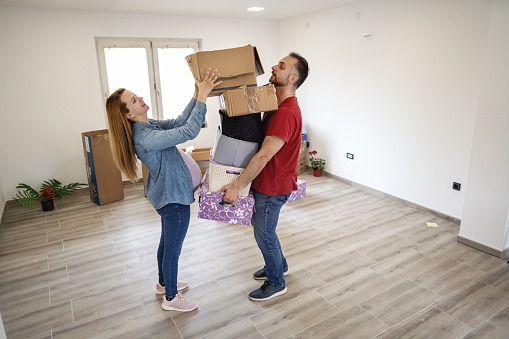 Couple have plenty of job while moving in together in new home