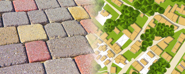 istock Colored concrete permeable flooring called self-locking floor assembled on a substrate of sand along the streets, sidewalks, an squares of the city - concept with imaginary city map 1314988036