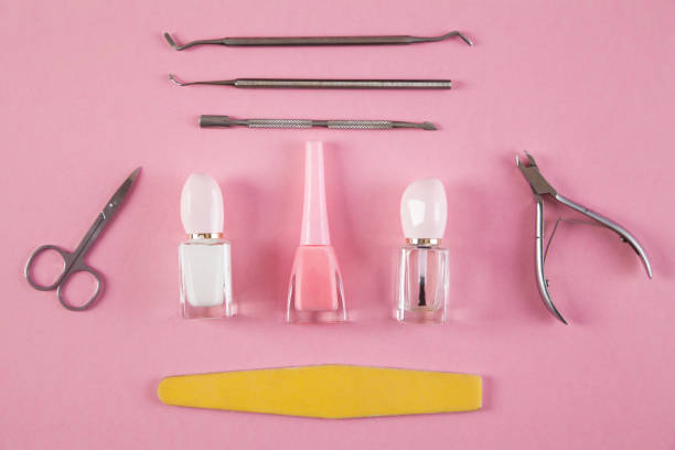 istock Manicure accessories on an isolated pink background. 1314990168