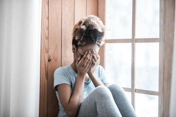 istock Upset dark skinned woman covering face with hands 1314994534