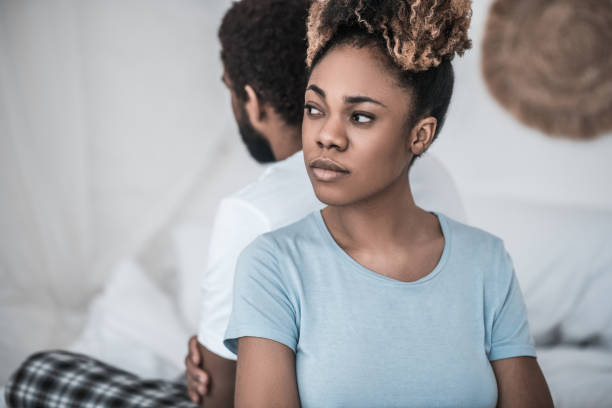 istock African American in depressed mood with back to husband 1314994610