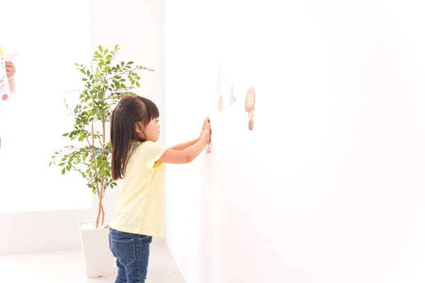 istock Child putting a seal 1314999679