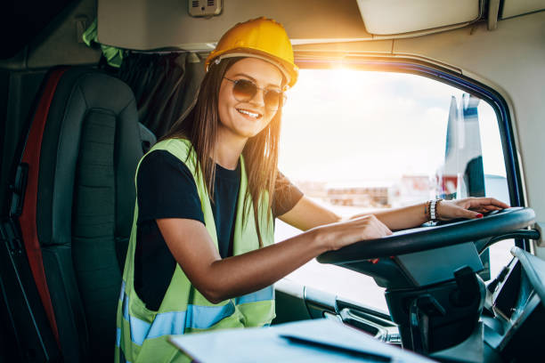 istock Professional happy female truck driver working 1315000565