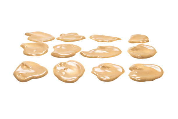 istock Mushroom sauce splashes isolated on white background. 1315001650