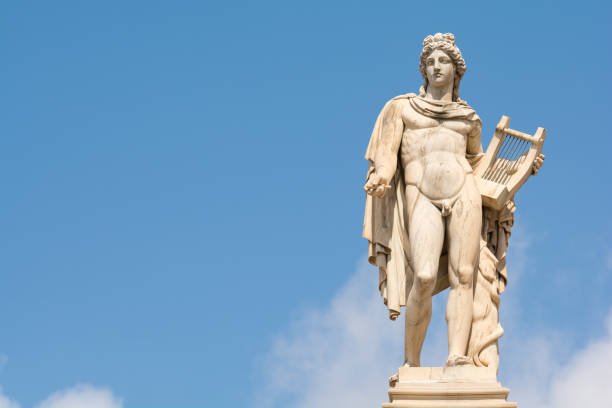The statue of Apollo in Athens, Greece The statue of Apollo. Member of the Twelve Olympians, God of oracles, healing, archery, music and arts, sunlight, knowledge, herds and flocks, and protection of the young classical greek stock pictures, royalty-free photos & images