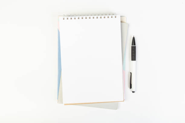 istock top view of open notebook with pen on gray background, school notebooks with coil spring, office notebook flat lay 1315010563