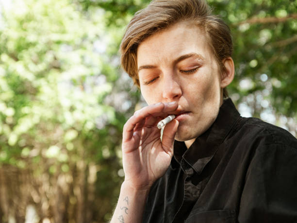 istock Transgender woman lighting the cigarette 1315010665