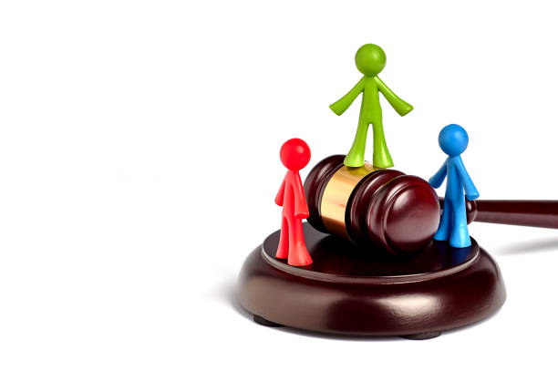 istock . Toy plastic men isolated on white background. The arbitrator examines a conflict situation between people. Court and law. Justice. Verdict. Legal support. Conflict of interest. Smoothing disputes. 1315010710